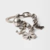 Armband med metallberlocker Armband med metallberlocker
