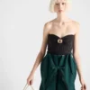 Bandeau-top i ull och kashmir med brosch Bandeau-top i ull och kashmir med brosch