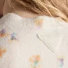 Blommig tröja i ull med rund hals Blommig tröja i ull med rund hals