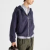Blousonjacka med huva i tekniskt tyg Blousonjacka med huva i tekniskt tyg