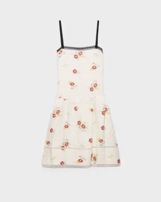 Broderad miniklänning i linne med blommotiv