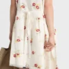 Broderad miniklänning i linne med blommotiv Broderad miniklänning i linne med blommotiv