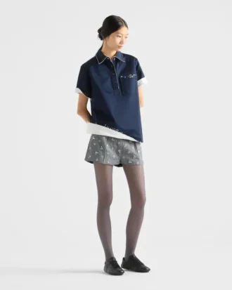 Broderade shorts i ull med smala ränder