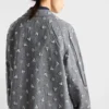 Enkelknäppt broderad randig kappa Enkelknäppt broderad randig kappa