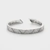Eternal Gold armband i vitguld med pavé-diamanter Eternal Gold armband i vitguld med pavé-diamanter