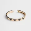 Eternal Gold Bangle-armband i gult guld med keramiska element Eternal Gold Bangle-armband i gult guld med keramiska element
