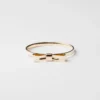 Eternal Gold Bow Bangle-armband – gult guld Eternal Gold Bow Bangle-armband – gult guld