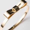 Eternal Gold Bow Bangle-armband – gult guld Eternal Gold Bow Bangle-armband – gult guld