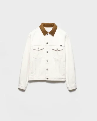 Gammal jeansjacka med läderdetaljer
