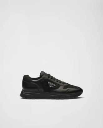 Högskurna sneakers i läder och Re-Nylon