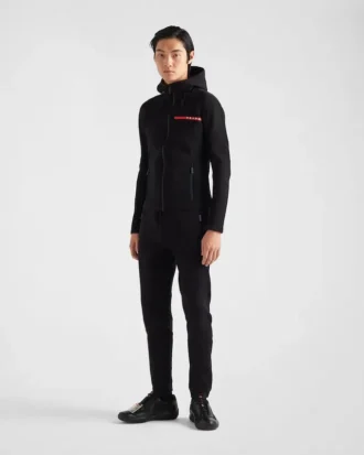 Hoodie i tekniskt tyg