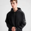 Huvtröja i bomullsfleece och Re-Nylon Huvtröja i bomullsfleece och Re-Nylon