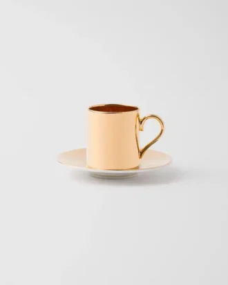 Kaffekopp i porslin – massivt guld