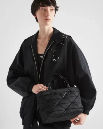 Liten vadderad tygväska i Re-Nylon