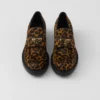 Loafers i chokladbrunt tryckt läder Loafers i chokladbrunt tryckt läder