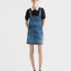 Miniklänning i denim med hängslen Miniklänning i denim med hängslen