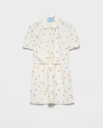 Miniklänning i poplin med blommönster Miniklänning i poplin med blommönster