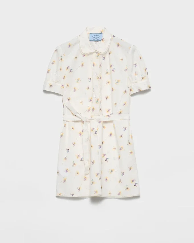 Miniklänning i poplin med blommönster Miniklänning i poplin med blommönster