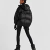 Oversized teknisk dunjacka i Re-Nylon
