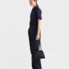 Prada Passage Medium läderväska med Re-Nylon-flik