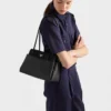 Prada Passage Medium läderväska med Re-Nylon-flik