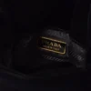 Prada Petit Sac Noir Mini-bucketväska i sammet och nappaläder Prada Petit Sac Noir Mini-bucketväska i sammet och nappaläder