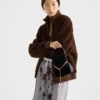 Prada Petit Sac Noir Mini-bucketväska i sammet och nappaläder Prada Petit Sac Noir Mini-bucketväska i sammet och nappaläder
