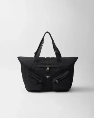 Resväska i Re-Nylon och läder