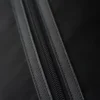 Resväska i Re-Nylon och Saffiano-läder Resväska i Re-Nylon och Saffiano-läder
