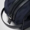 Resväska i Re-Nylon och Saffiano-läder Resväska i Re-Nylon och Saffiano-läder