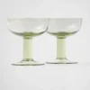 Set med två champagneglas i kristall – Plinth Set med två champagneglas i kristall – Plinth