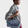 Stor duffelväska i Re-Nylon och Saffiano-läder Stor duffelväska i Re-Nylon och Saffiano-läder