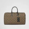 Stor resväska i tyg med broderat Prada-symbole Stor resväska i tyg med broderat Prada-symbole