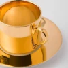 Tekopp i porslin – massivt guld Tekopp i porslin – massivt guld