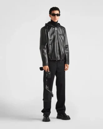 Vändbar jacka i nappaläder och Re-Nylon