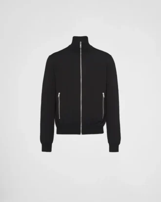 Vändbar jacka i ull och Re-Nylon