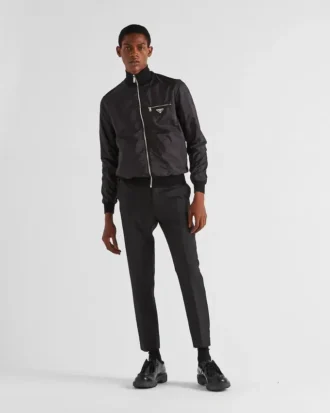 Vändbar jacka i ull och Re-Nylon