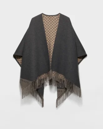 Vändbar poncho i ull och kashmir